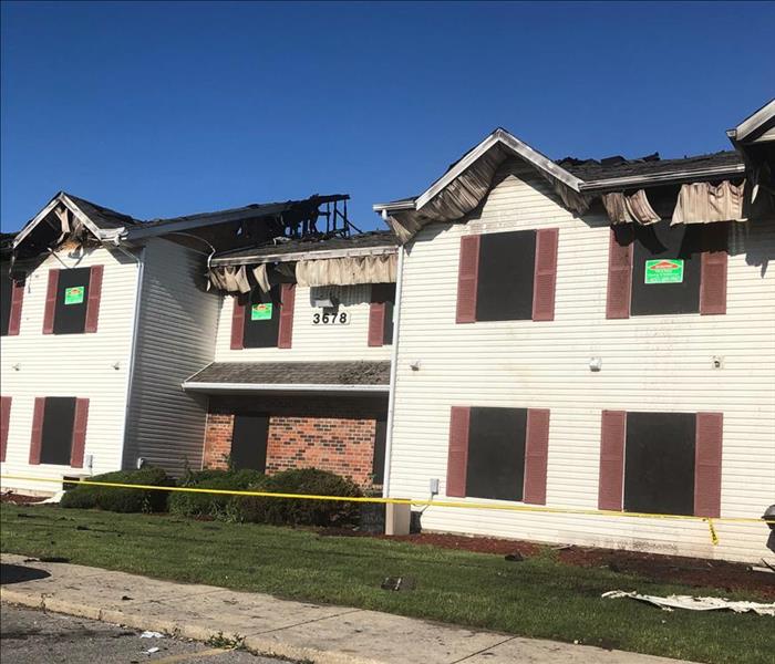 Board up services after fire at apartment complex